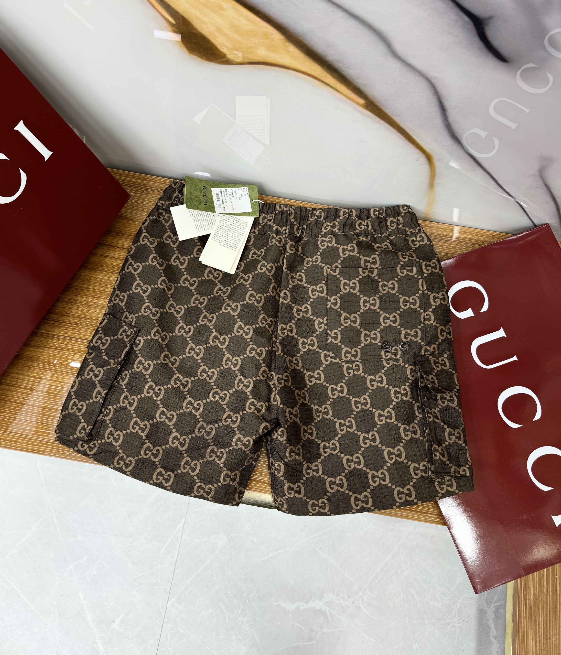 Quần short gió Gucci GC họa tiết monogram logo GG full Like Auth 1-1 on web CD