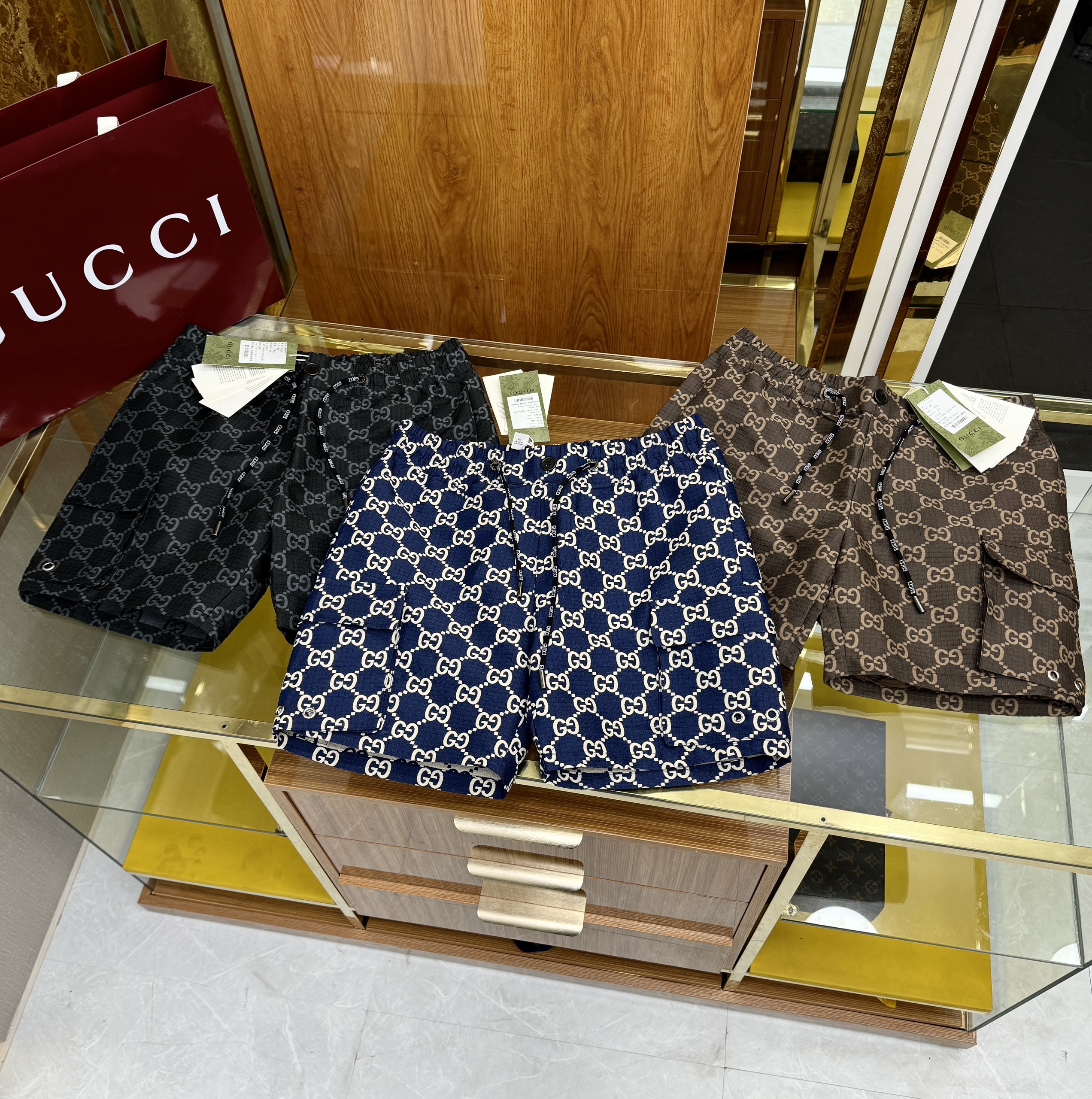 Quần short gió Gucci GC họa tiết monogram logo GG full Like Auth 1-1 on web CD