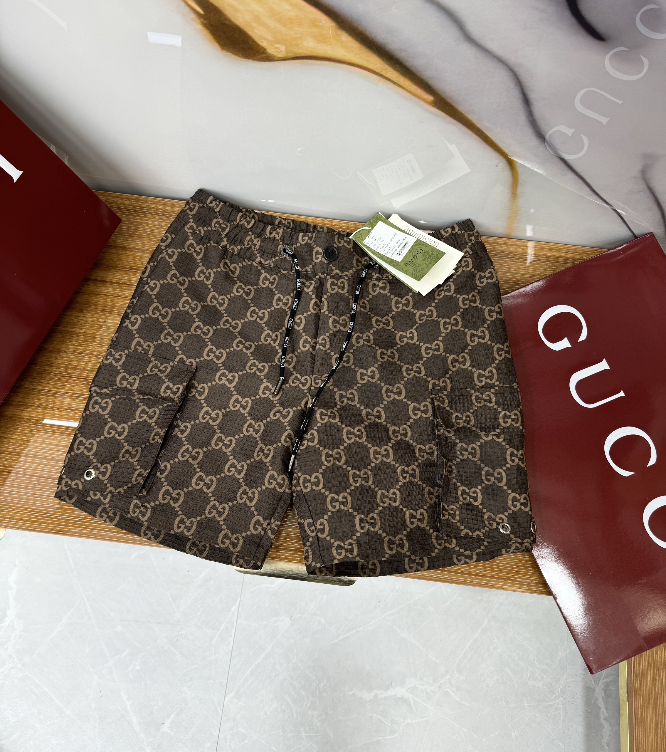 Quần short gió Gucci GC họa tiết monogram logo GG full Like Auth 1-1 on web CD