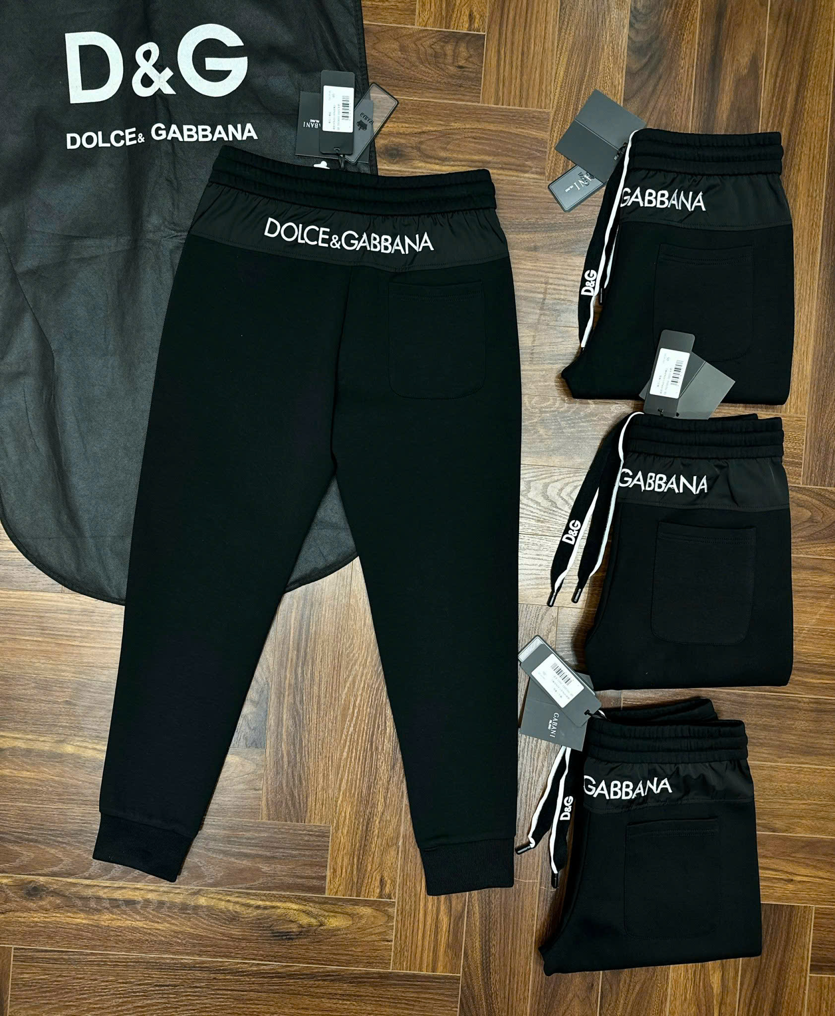 Quần jogger nỉ Dolce Gabbana DG Đen trơn logo tag vuông đùi check cạp sau Like Auth 44-50 CD