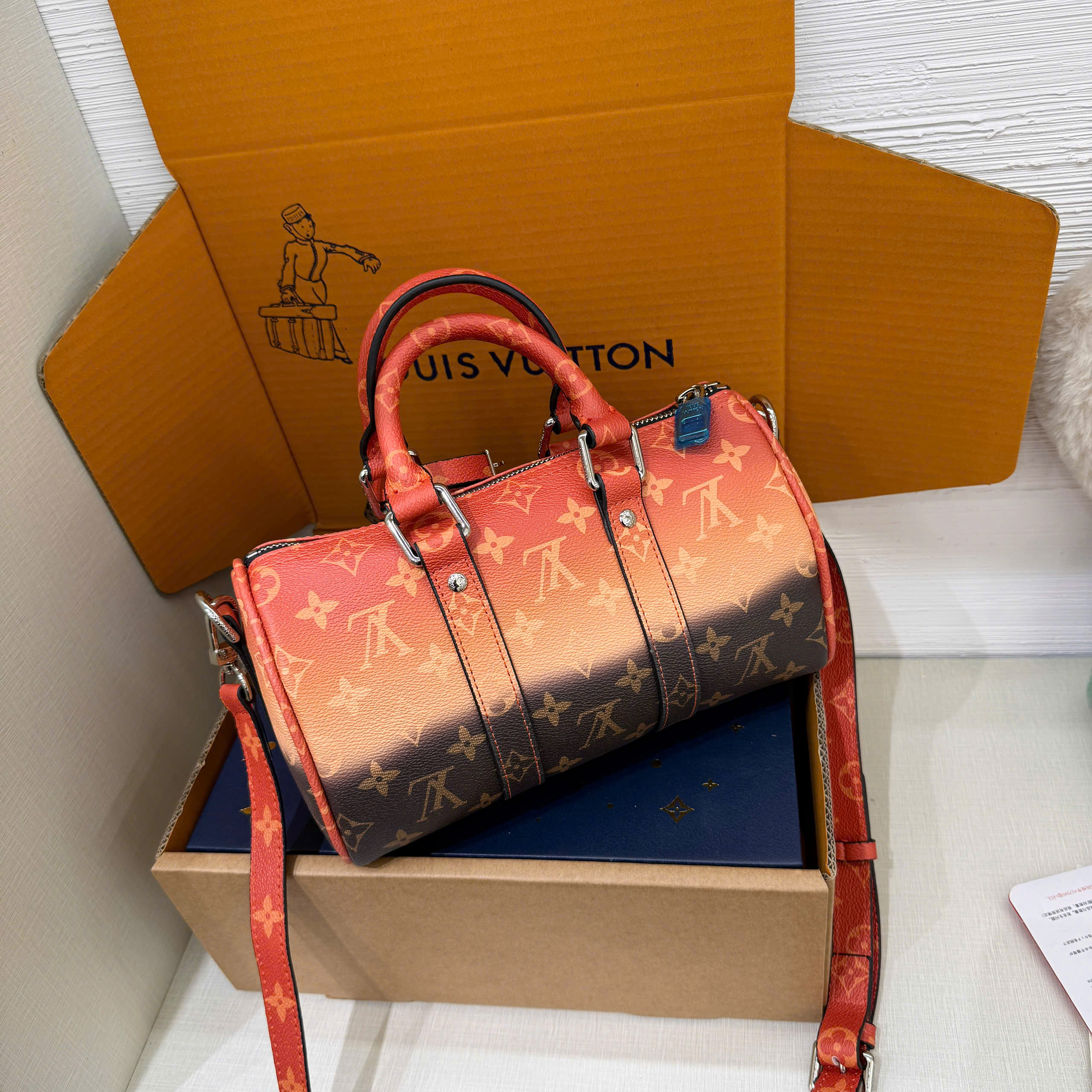 Túi đeo chéo Louis Vuitton Lv Keepall Bandoulifere Like Auth 25x15x11 PLD