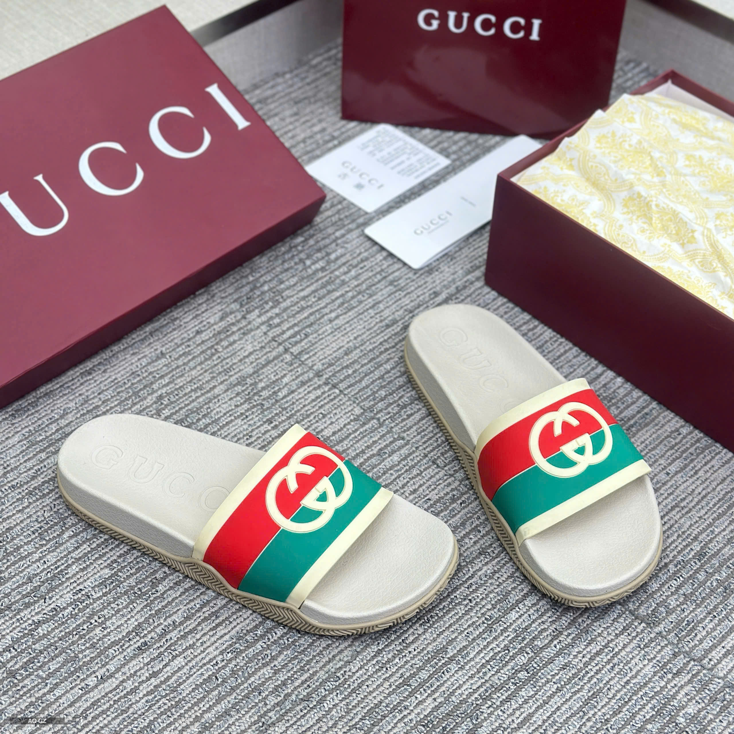 Dép lê quai ngang Gucci logo GC quai sọc new 2026 Like Auth 38-43 LVQ