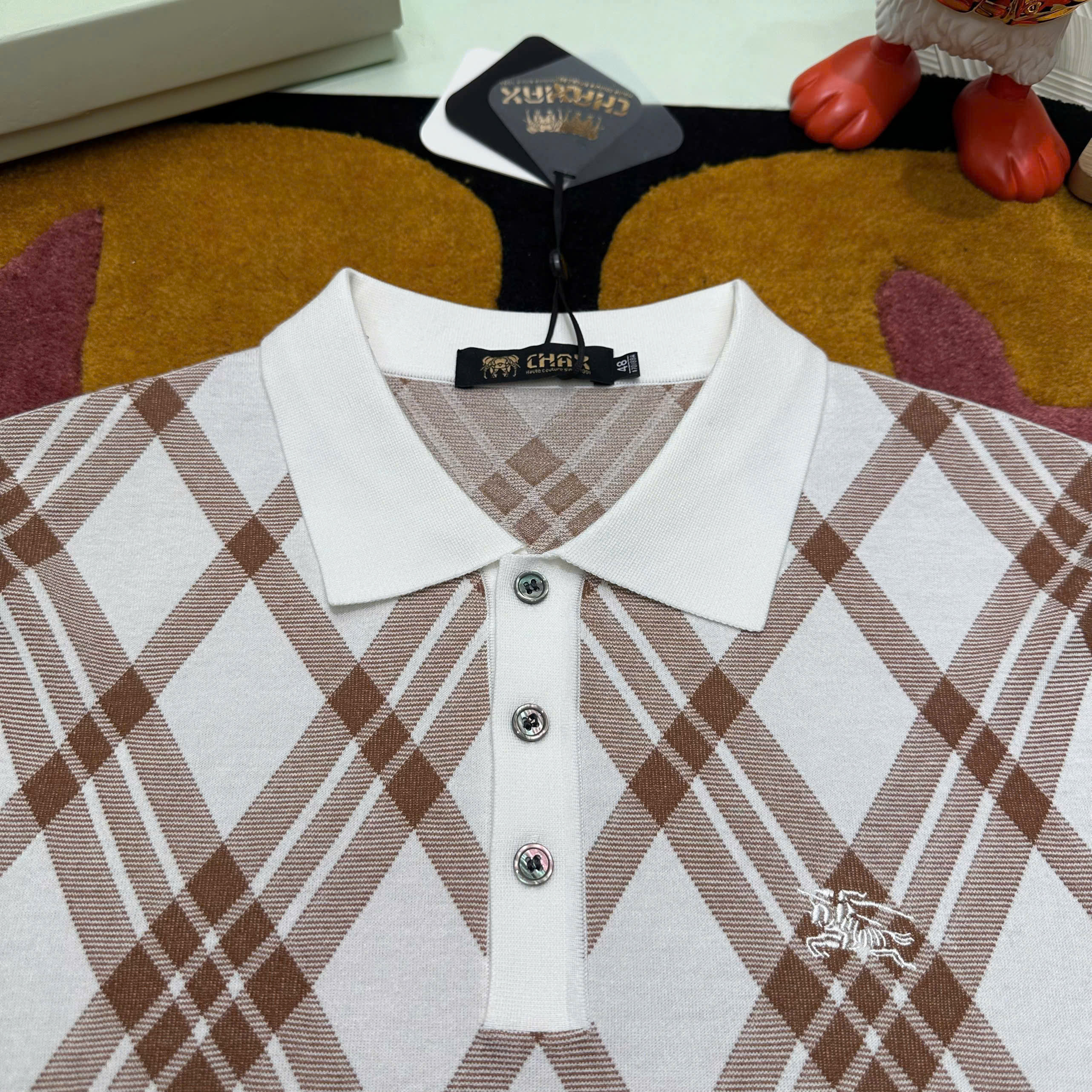 Áo polo len dài tay Burberry BBR  Trắng kẻ sọc chéo Like Auth 48-52 MK