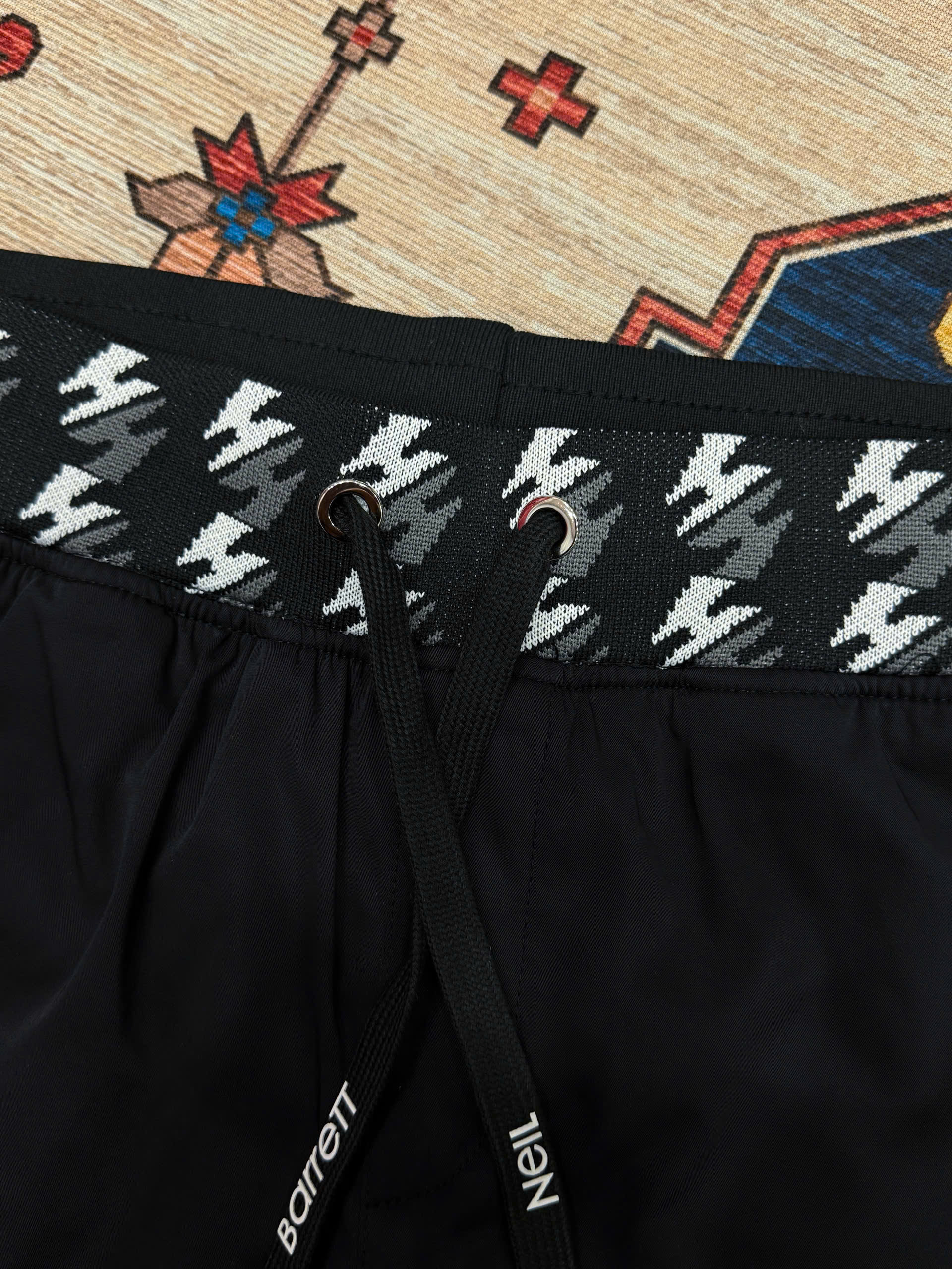 Quần short đùi gió Neil Barret check cạp logo thêu tia sét Like Auth S-XL MK