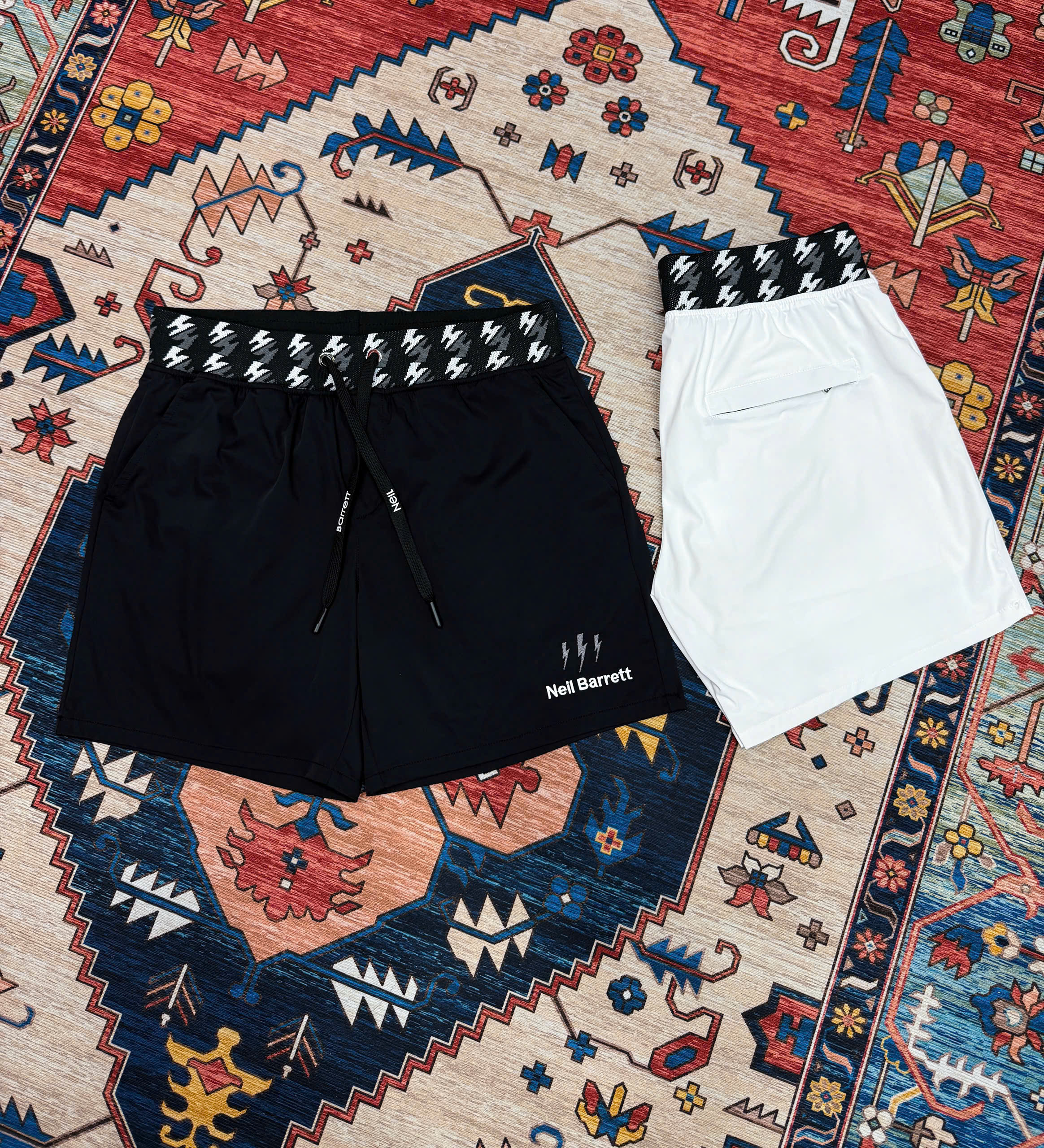 Quần short đùi gió Neil Barret check cạp logo thêu tia sét Like Auth S-XL MK