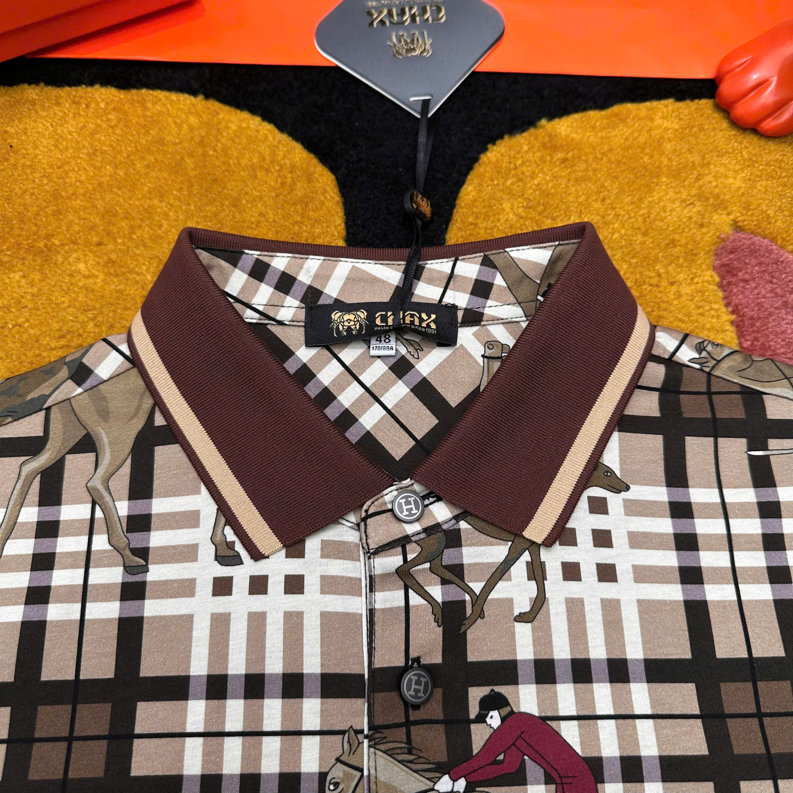 C:\Users\ADMIN\Downloads\20260227-20260302T070939Z-3-001\20260227\1380 Áo polo hình Hermes HM họa tiết cưỡi ngựa Like Auth 1-1 on web 48-52 MK