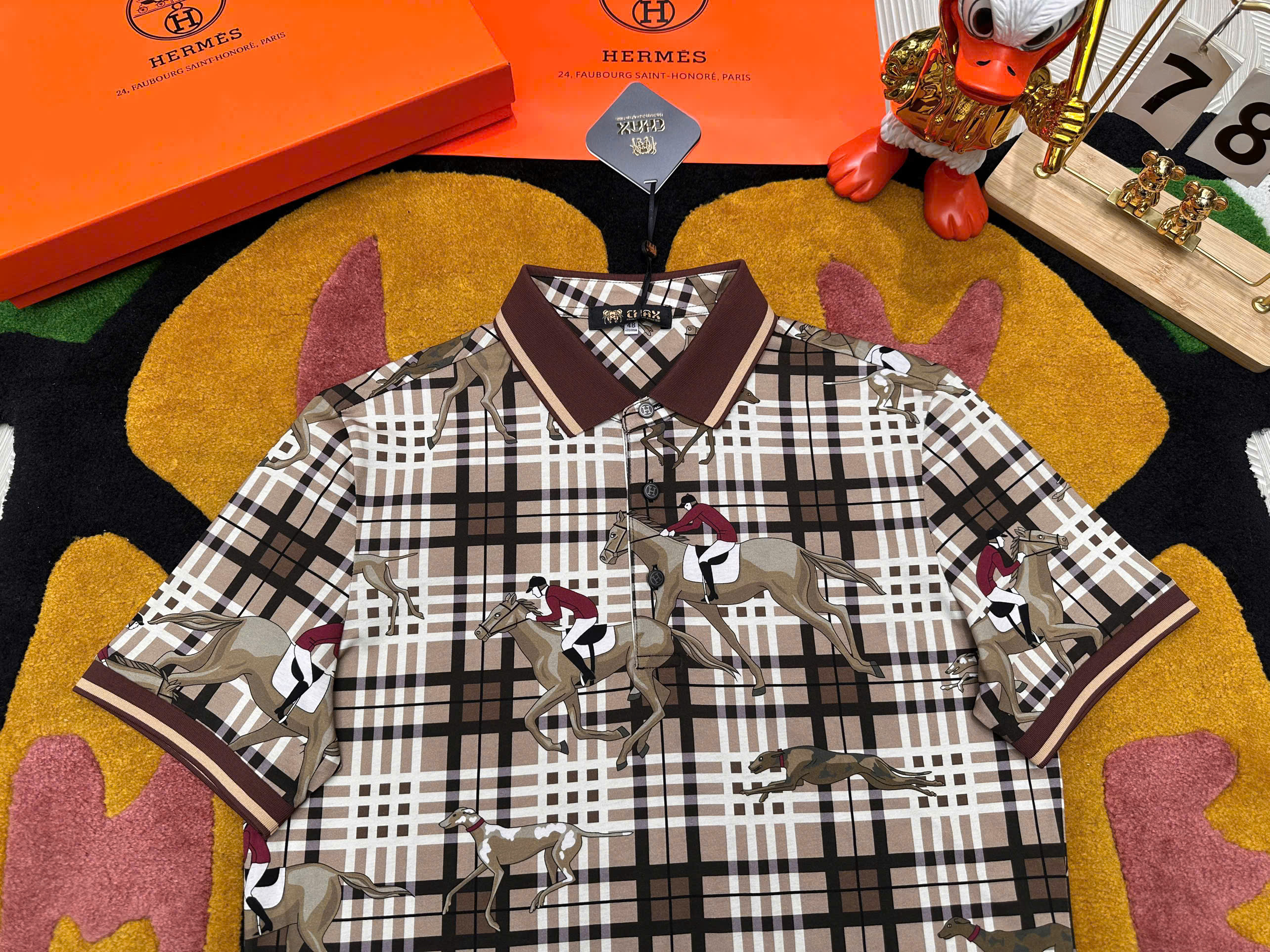 C:\Users\ADMIN\Downloads\20260227-20260302T070939Z-3-001\20260227\1380 Áo polo hình Hermes HM họa tiết cưỡi ngựa Like Auth 1-1 on web 48-52 MK