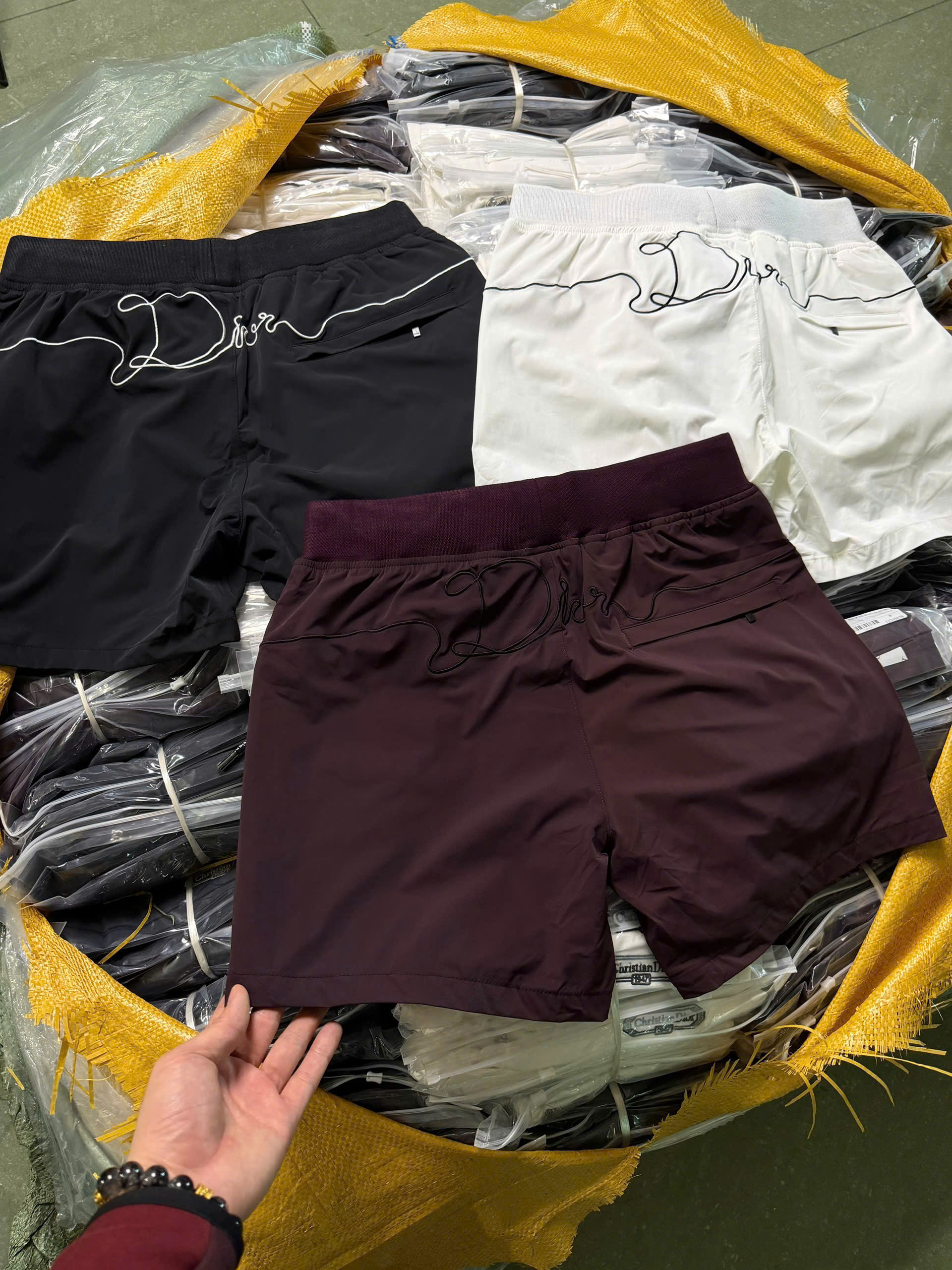 Quần short đùi gió Dior CD logo bo cạp tag đùi Like Auth S-XL MK