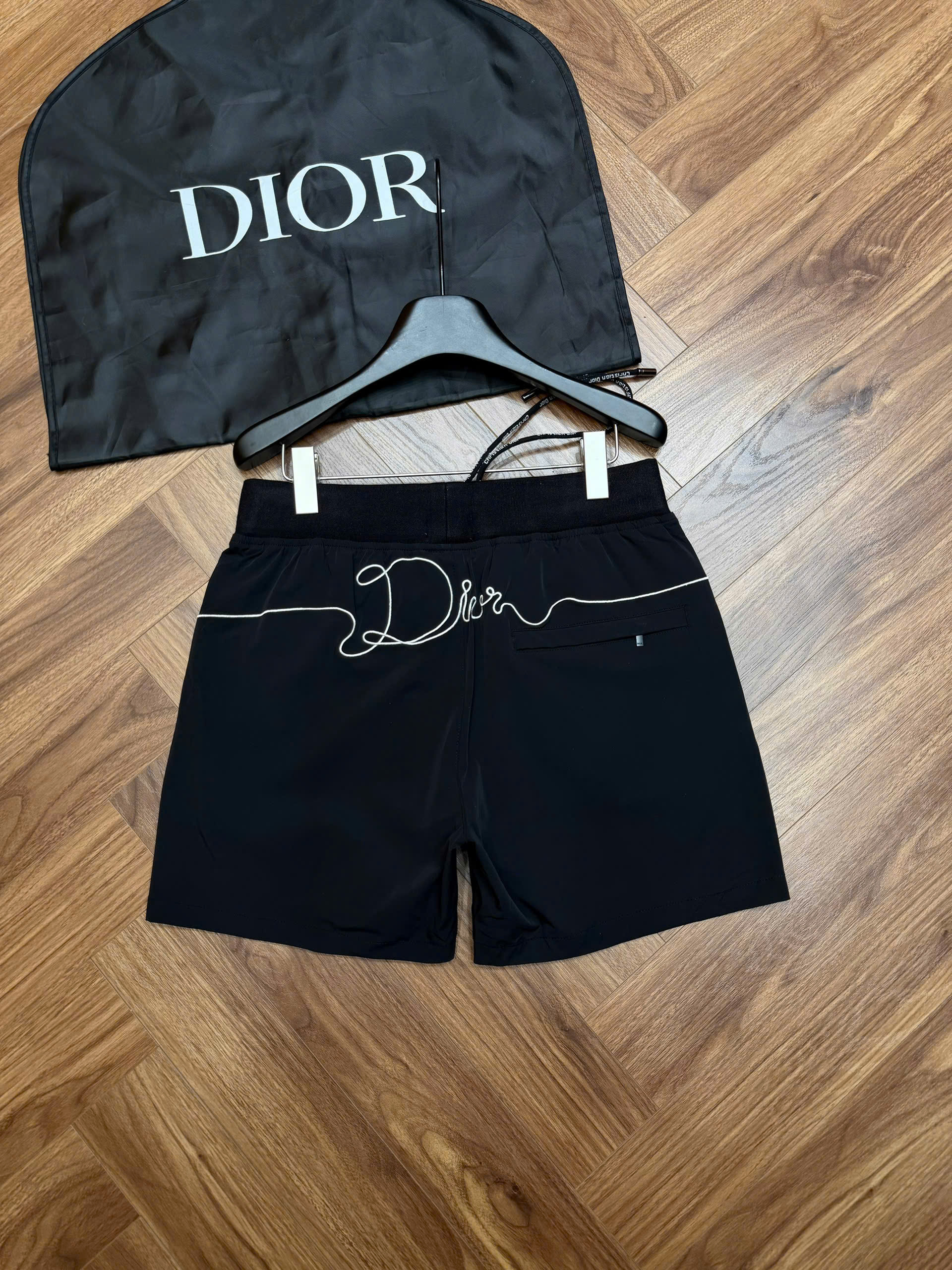 Quần short đùi gió Dior CD logo bo cạp tag đùi Like Auth S-XL MK