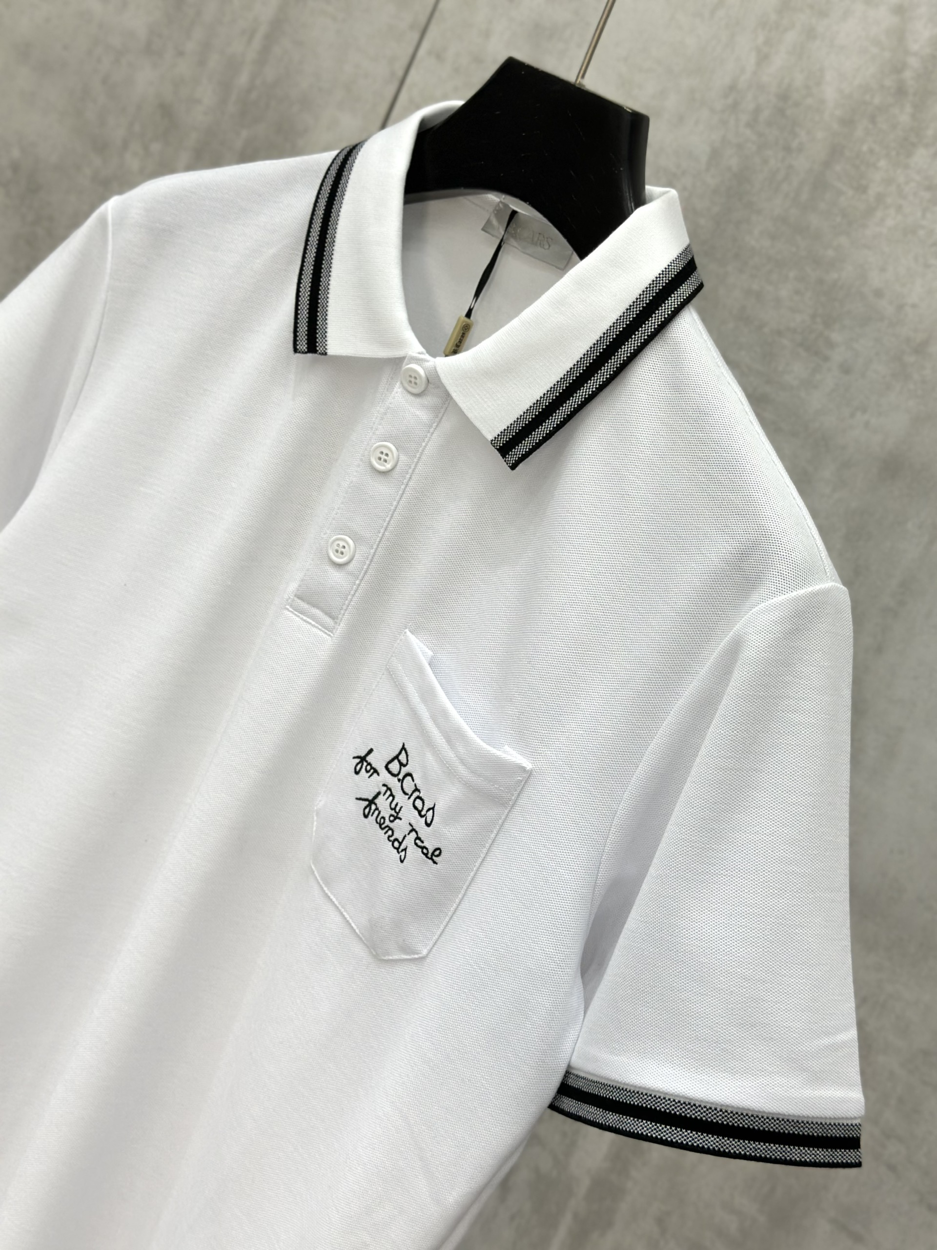 Áo polo Caras logo thêu túi ngực kẻ sọc viền tay cổ new 2026 Like Auth S-XL VTN