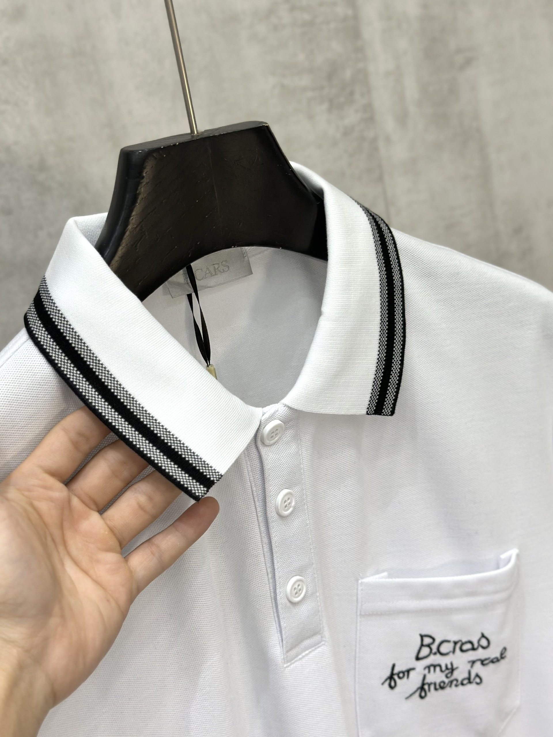 Áo polo Caras logo thêu túi ngực kẻ sọc viền tay cổ new 2026 Like Auth S-XL VTN