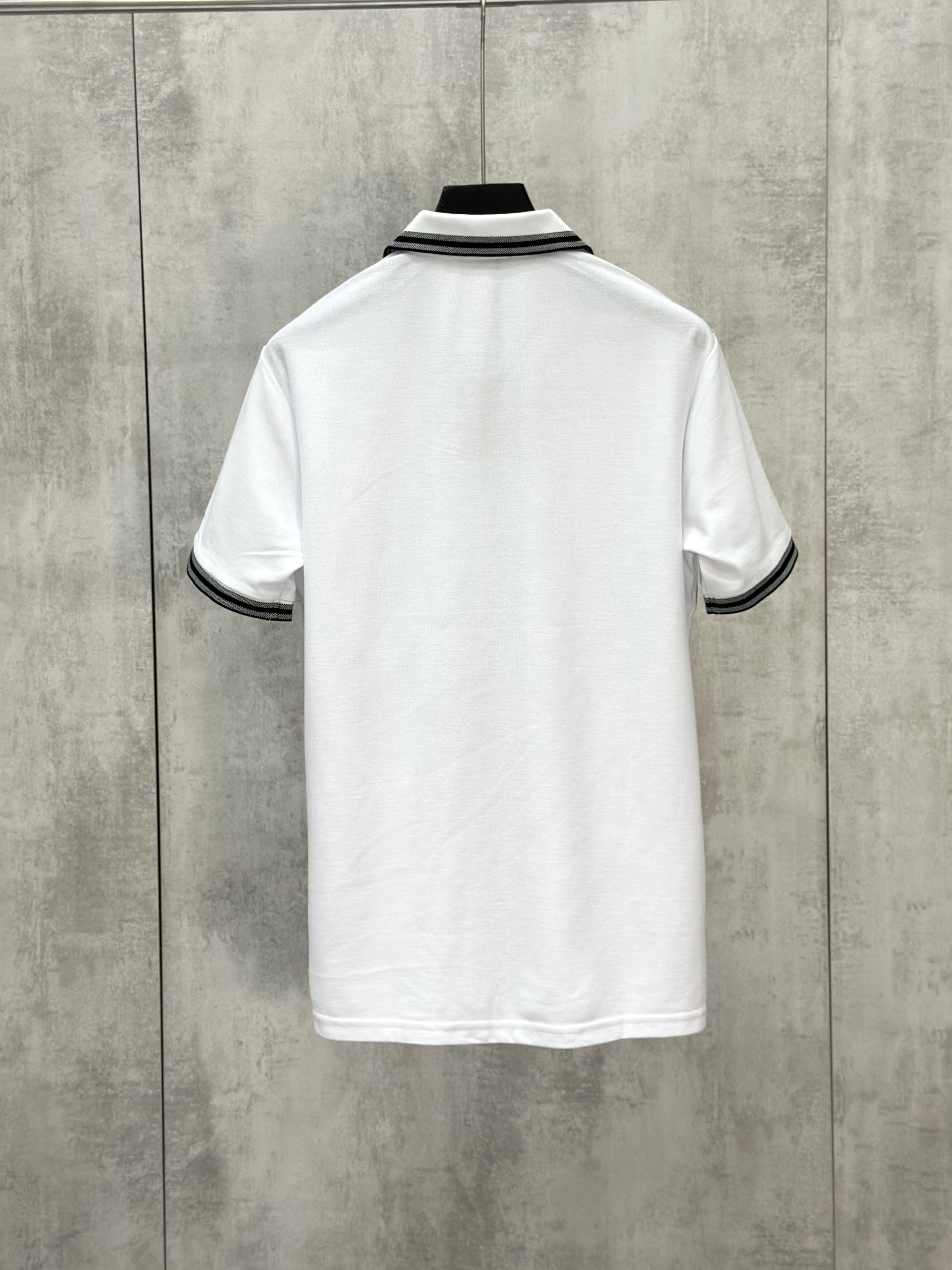 Áo polo Caras logo thêu túi ngực kẻ sọc viền tay cổ new 2026 Like Auth S-XL VTN