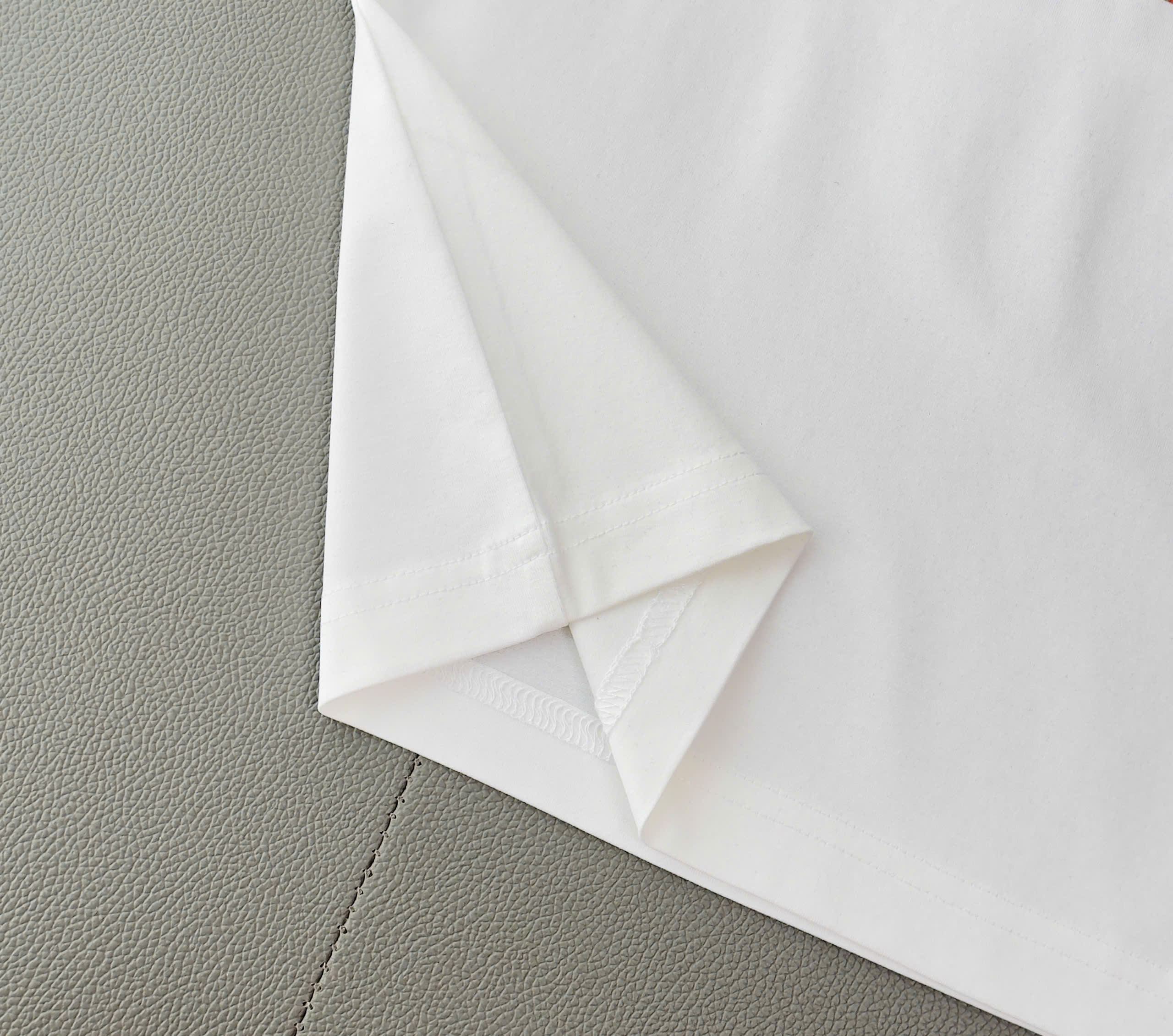 Áo phông T shirt Hermes HM wash ô vuông Cam ngực hình đính đá Like Auth S-XL DDT