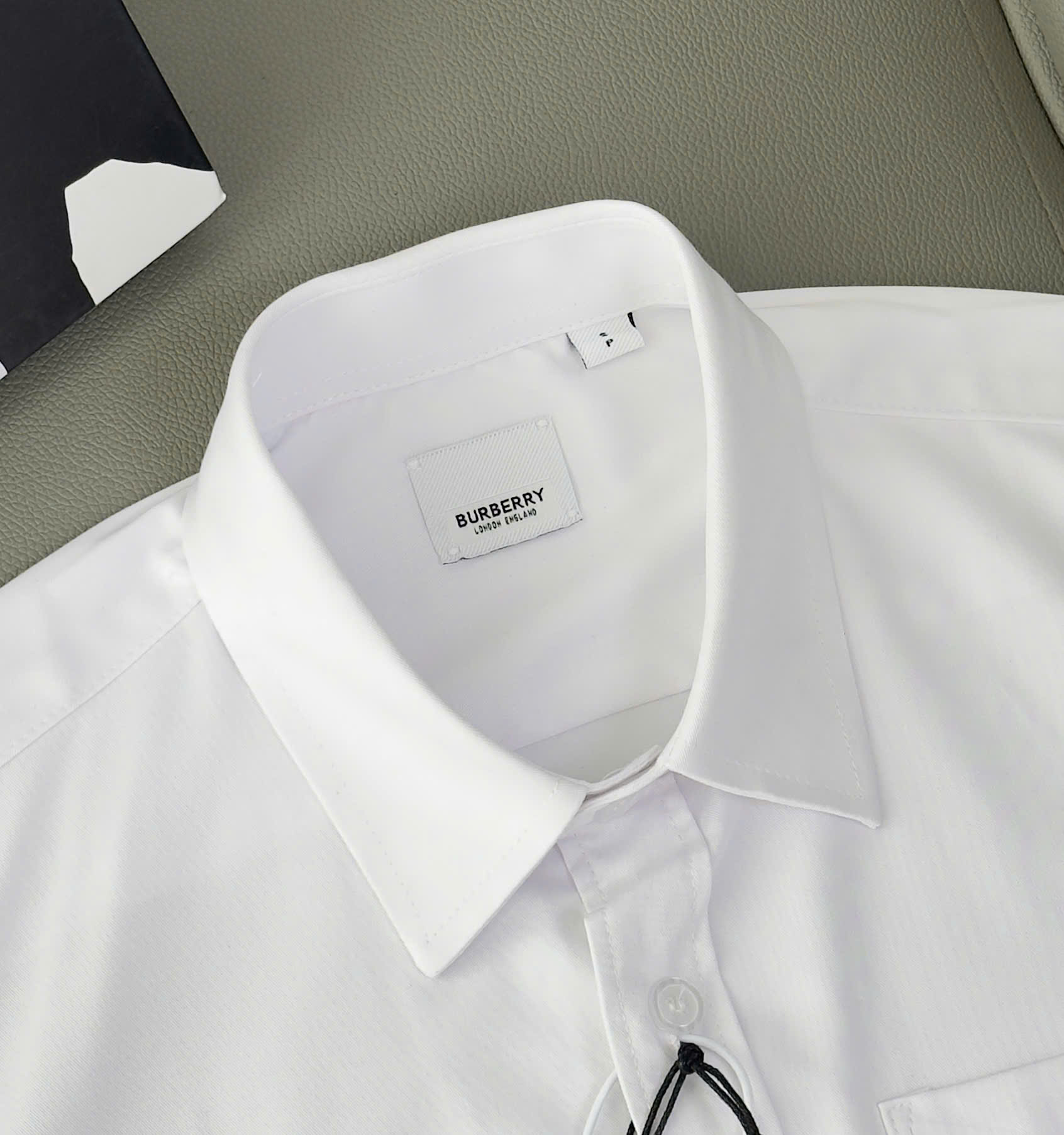Áo sơ mi Burberry BBR dài tay Trắng logo thêu ngực TB Like Auth S-XXL DDT