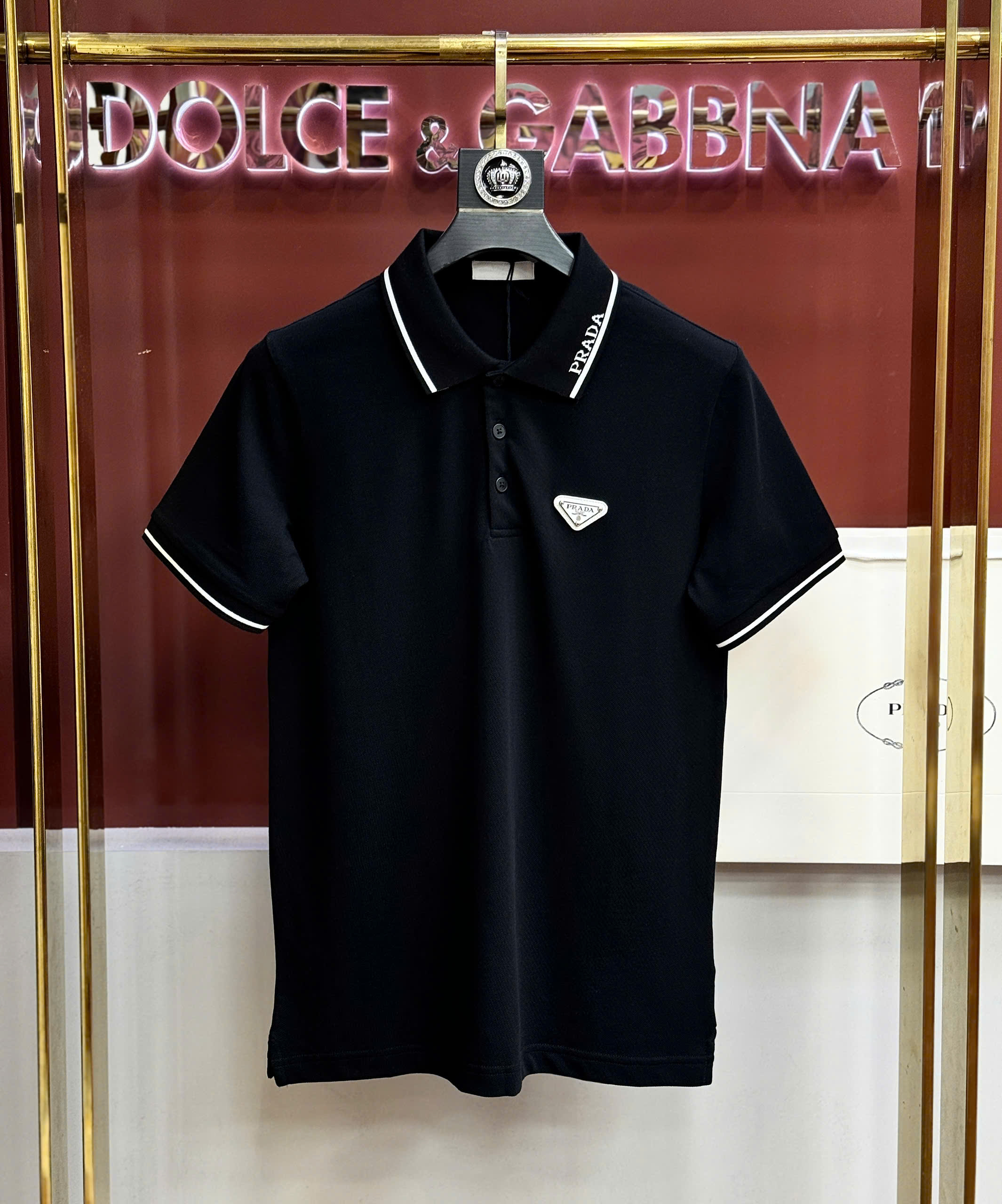 Áo polo Prada logo check cổ tag tam giác ngực Like Auth S-XL CD