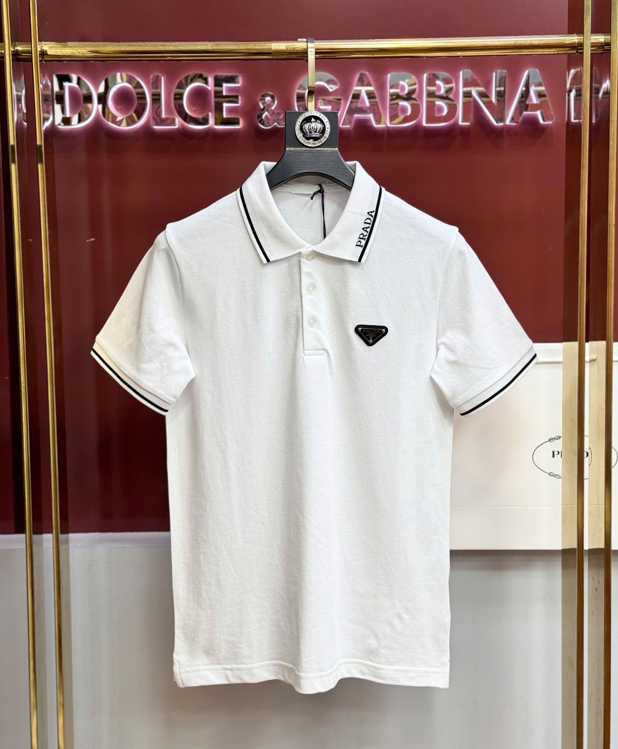 Áo polo Prada logo check cổ tag tam giác ngực Like Auth S-XL CD