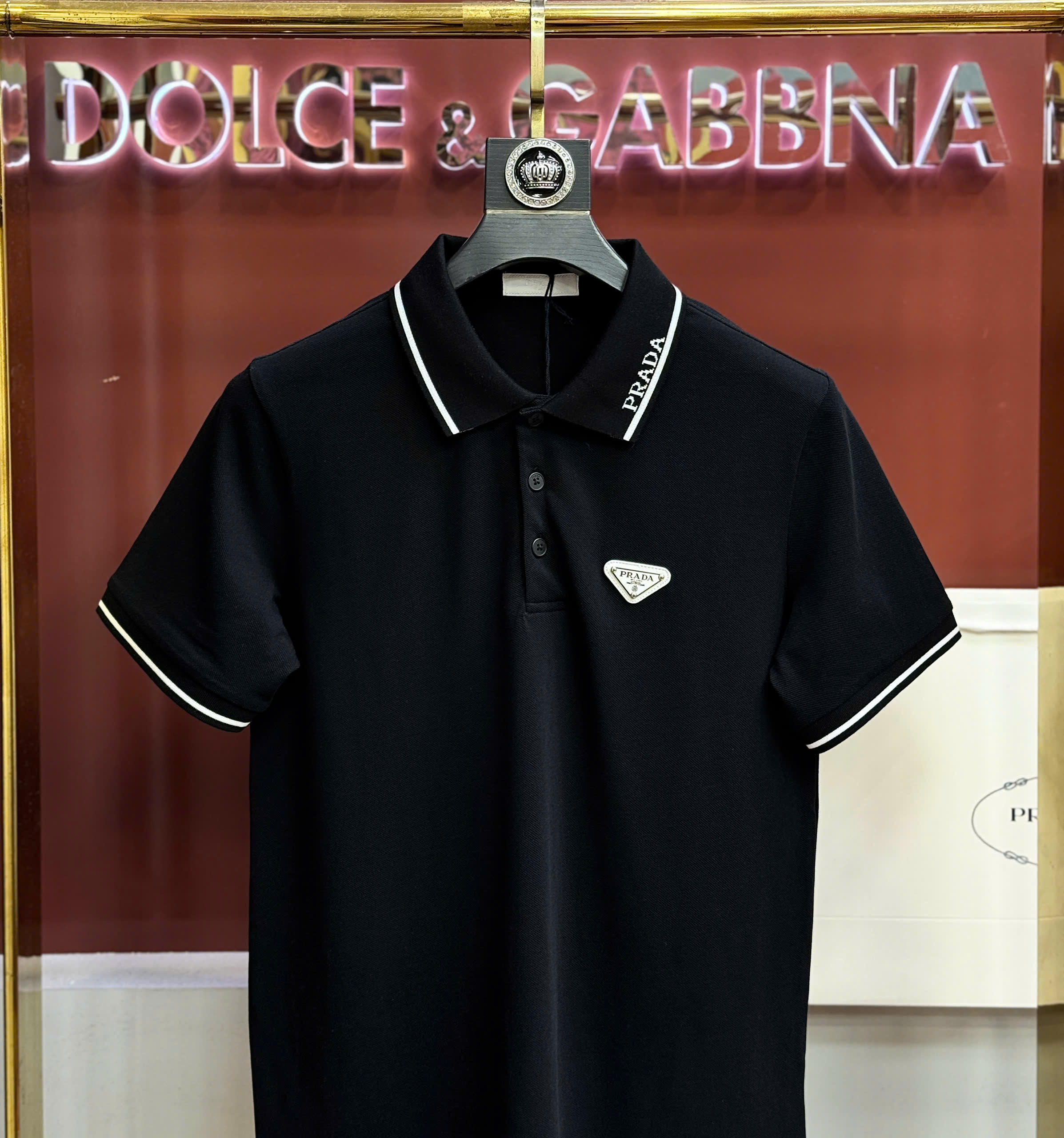 Áo polo Prada logo check cổ tag tam giác ngực Like Auth S-XL CD