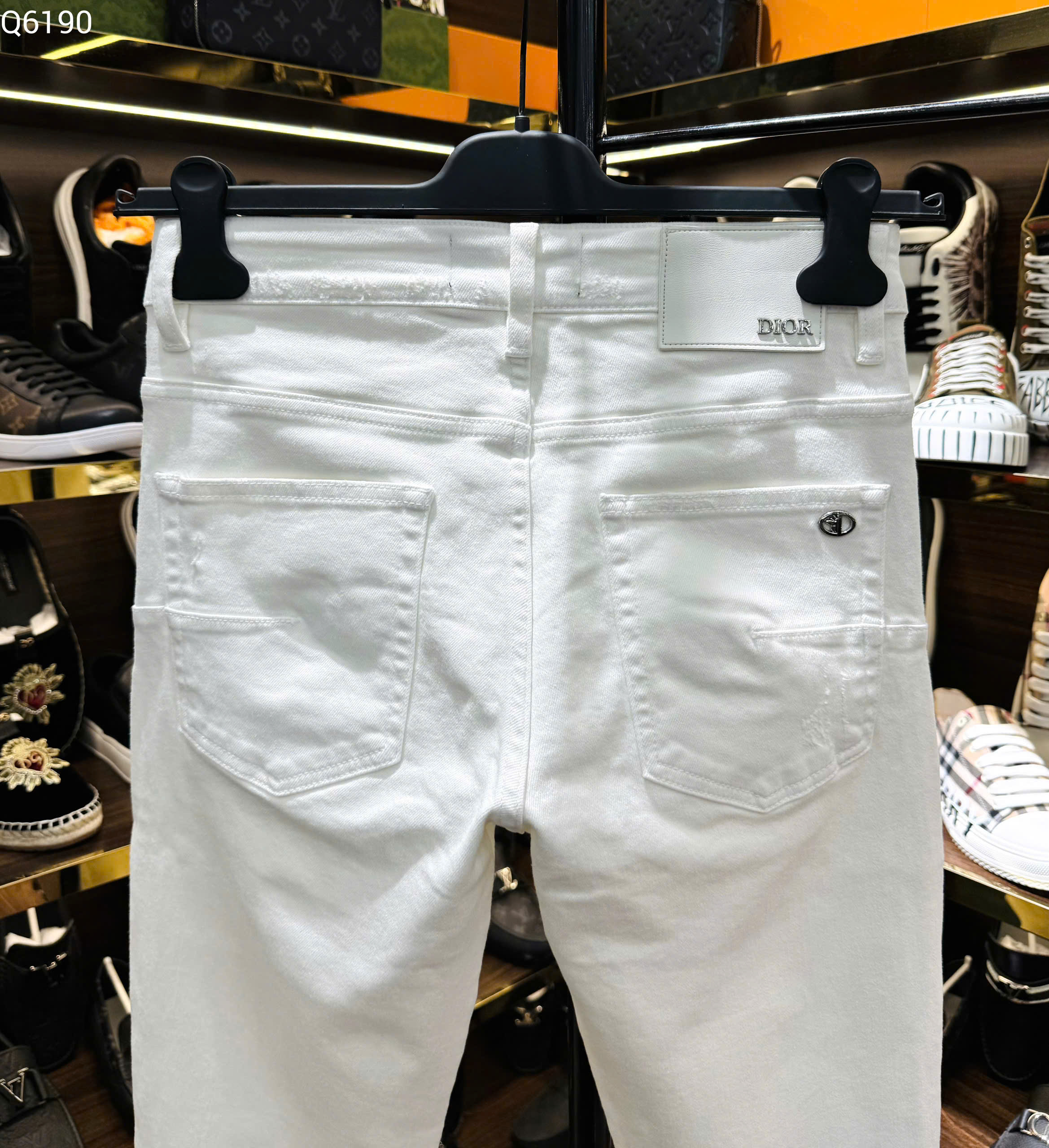 Quần Jean Dior CD Trắng  rách mài logo chữ xắn gấu Like Auth on web MK