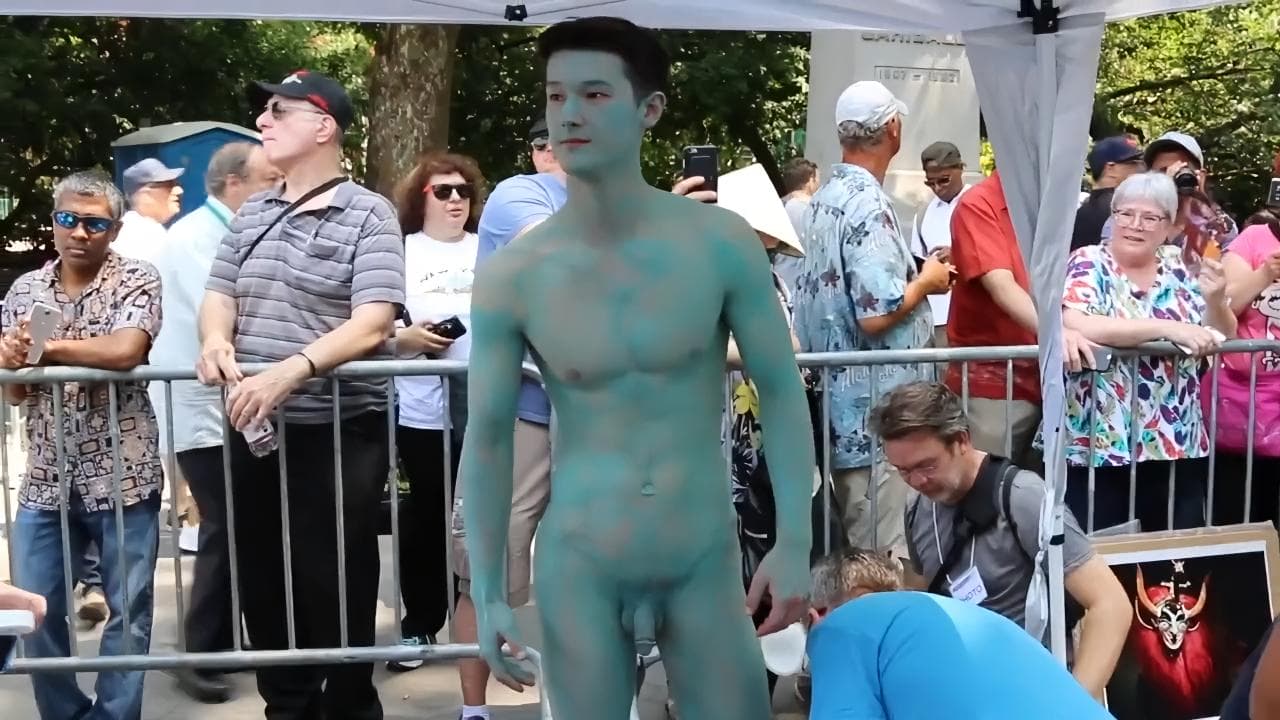 Naked handsome man acts as a model for an artist to paint his body porn gay