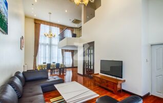 Living room with high ceiling